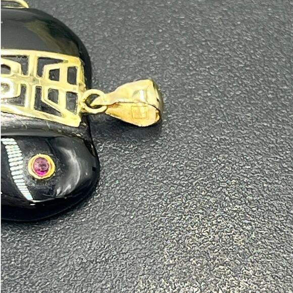 Designer 1 1/4" 14K Gold Carved
Onyx Elephant with Red Ruby Eyes
Pendant - Picture 5 of 12